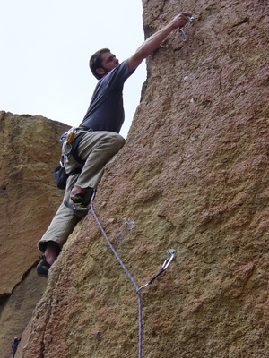Travis Wiggins leading the Unnamed Arete 5.10b - Morning Glory - Smith Rock - Climbing Oregon