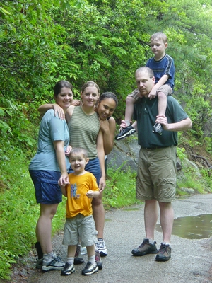 The family soaking wet after a good southern downpour