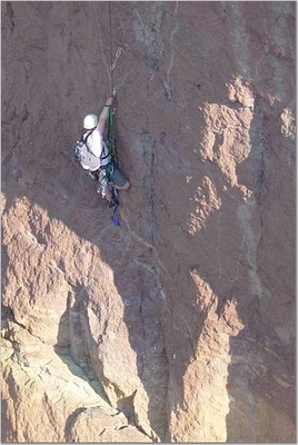 Jody O'Donnell aiding up the bolt ladder on the Pioneer Route - Monkey Face - Smith Rock