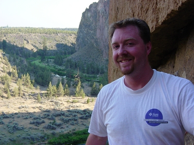 Jody O'Donnell at the belay station on Cinnamon Slab - Climbing Oregon