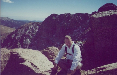 Jody O'Donnell sitting around the Cirque on Pike's Peak - Hiking Colorado