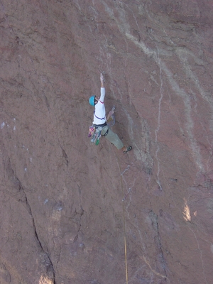 Larry Brumwell, owner of Inclimb rock gym in Bend, Oregon, leading the bolt ladder - Monkey Face