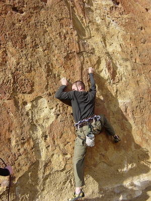 Travis climbing up Gumby 5.10b - Zebra Wall - Morning Glory Wall