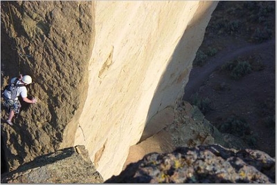 Jody O'Donnell looking over the neck of Monkey Face - Climbing Oregon