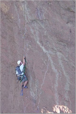 Jody O'Donnell aiding up the bolt ladder - Smith Rock - Monkey Face
